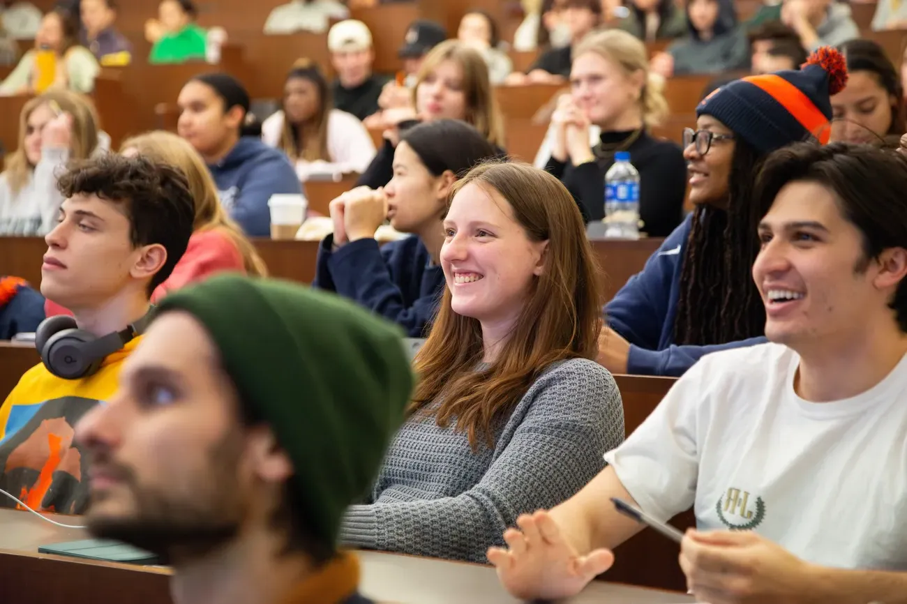 Students sitting in a lecture hall.